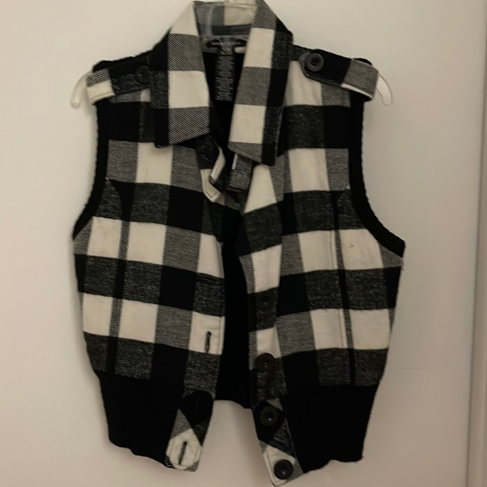 Women’s size XL black and white plaid vest.
